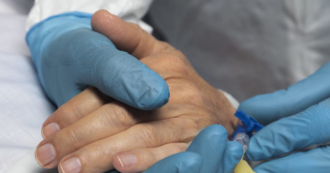 close-up-doctor-putting-cannula